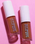 Two lip gloss bottles labeled 'Glow Getter' 