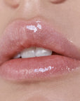 Close-up of lips with a light pink lip balm applied